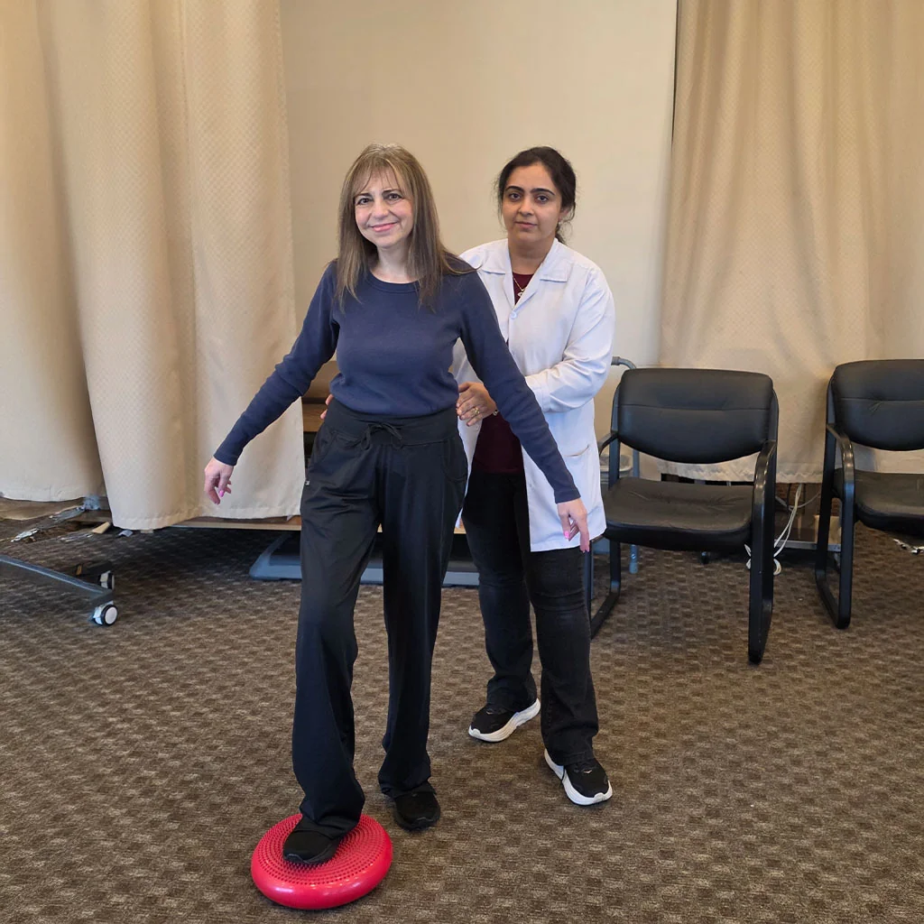Physical therapist performing vestibular rehabilitation at Dynamic Physical Therapy in Queens